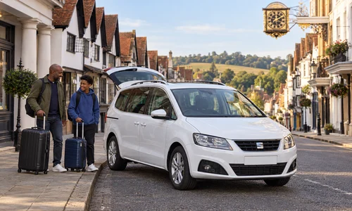 Illustration of a taxi pickup with luggage in Guildford for a Heathrow transfer